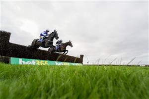 TAUNTON, ENGLAND - NOVEMBER 12: Ben Jones riding Irish Prophecy (R) on their way to winning The Arthur & Peggy White Memorial Handicap Chase at Taunton Racecourse on November 12, 2020 in Taunton, England. Owners are allowed to attend if they have a runner at the meeting otherwise racing remains behind closed doors to the public due to the Coronavirus pandemic. (Photo by Alan Crowhurst/Getty Images)