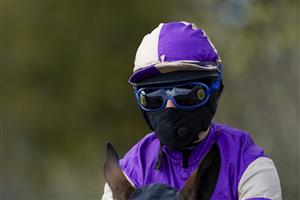 TAUNTON, ENGLAND - NOVEMBER 12: Jockey Victoria Malzard masked and ready to race at Taunton Racecourse on November 12, 2020 in Taunton, England. Owners are allowed to attend if they have a runner at the meeting otherwise racing remains behind closed doors to the public due to the Coronavirus pandemic. (Photo by Alan Crowhurst/Getty Images)