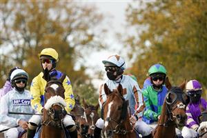 TAUNTON, ENGLAND - NOVEMBER 12: Jockey Cillin Leonard riding Mr Caffrey (green) circles at the start before winning The Cornish Rock Gin Selling Hurdle at Taunton Racecourse on November 12, 2020 in Taunton, England. Owners are allowed to attend if they have a runner at the meeting otherwise racing remains behind closed doors to the public due to the Coronavirus pandemic. (Photo by Alan Crowhurst/Getty Images)