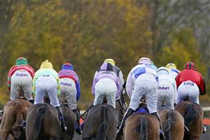 TAUNTON, ENGLAND - NOVEMBER 12: A general view of action during The Cornish Rock Gin Selling Hurdle at Taunton Racecourse on November 12, 2020 in Taunton, England. Owners are allowed to attend if they have a runner at the meeting otherwise racing remains behind closed doors to the public due to the Coronavirus pandemic. (Photo by Alan Crowhurst/Getty Images)