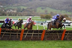 CHELTENHAM, ENGLAND - NOVEMBER 13: David Bass riding Does He Know clear the last to win The Ballymore Novices' Hurdle at Cheltenham Racecourse on November 13, 2020 in Cheltenham, England. Owners are allowed to attend if they have a runner at the meeting otherwise racing remains behind closed doors to the public due to the Coronavirus pandemic. (Photo by Alan Crowhurst/Getty Images)
