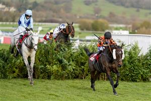 CHELTENHAM, ENGLAND - NOVEMBER 13: Tom Scudamore riding Kingswell Theatre clear the last to win The Glenfarclas Cross Country Handicap Chase at Cheltenham Racecourse on November 13, 2020 in Cheltenham, England. Owners are allowed to attend if they have a runner at the meeting otherwise racing remains behind closed doors to the public due to the Coronavirus pandemic. (Photo by Alan Crowhurst/Getty Images)