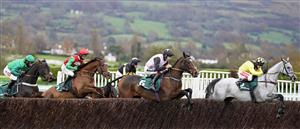 CHELTENHAM, ENGLAND - NOVEMBER 14: A general view of action with Cleeve Hill in the distance at Cheltenham Racecourse on November 14, 2020 in Cheltenham, England. Owners are allowed to attend if they have a runner at the meeting otherwise racing remains behind closed doors to the public due to the Coronavirus pandemic. (Photo by Alan Crowhurst/Getty Images)
