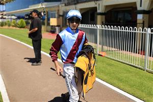 NEWCASTLE, AUSTRALIA - NOVEMBER 14: Jason Collett returns to scale after winning race 3 the Senpos Point Of Sale Benchmark 88 Handicap on Laure Me In during Racing at Newcastle Racecourse on November 14, 2020 in Newcastle, Australia. (Photo by Mark Evans/Getty Images)