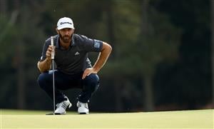 Dustin Johnson putts on the 18th green during the final round of the Masters at Augusta National Golf Club (Photo by Getty Images)