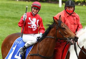 Jamie Kah aboard Sneaky Five celebrates after winning race two the Ingliss Banner during Melbourne Racing Cox Plate Day at Moonee Valley Racecourse (Getty Images)
