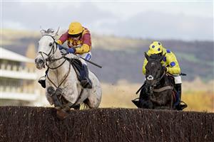 CHELTENHAM, ENGLAND - NOVEMBER 15: Tom Scudamore riding Ramses de Teillee (L) clear the last to win The Planteur At Chapel Stud Handicap Chase from Bryony Frost and Yala Enki (R) at Cheltenham Racecourse on November 15, 2020 in Cheltenham, England. Owners are allowed to attend if they have a runner at the meeting otherwise racing remains behind closed doors to the public due to the Coronavirus pandemic. (Photo by Alan Crowhurst/Getty Images)
