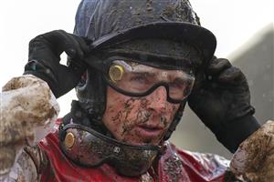 CHELTENHAM, ENGLAND - NOVEMBER 15: A wet and muddy afternoon for jockey Harry Skelton at Cheltenham Racecourse on November 15, 2020 in Cheltenham, England. Owners are allowed to attend if they have a runner at the meeting otherwise racing remains behind closed doors to the public due to the Coronavirus pandemic. (Photo by Alan Crowhurst/Getty Images)