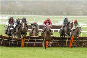 CHELTENHAM, ENGLAND - NOVEMBER 15: Robbie Power riding The Shunter (R, light blue) clear the last to win The Unibet Greatwood Handicap Hurdle at Cheltenham Racecourse on November 15, 2020 in Cheltenham, England. Owners are allowed to attend if they have a runner at the meeting otherwise racing remains behind closed doors to the public due to the Coronavirus pandemic. (Photo by Alan Crowhurst/Getty Images)