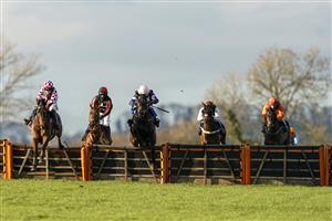 WINCANTON, ENGLAND - NOVEMBER 19: Tom Bellamy riding Dollnamix (L) clear the last to win The Watch Irish Racing On RacingTV Handicap Hurdle at Wincanton Racecourse on November 19, 2020 in Wincanton, England. Owners are allowed to attend if they have a runner at the meeting otherwise racing remains behind closed doors to the public due to the Coronavirus pandemic. (Photo by Alan Crowhurst/Getty Images)