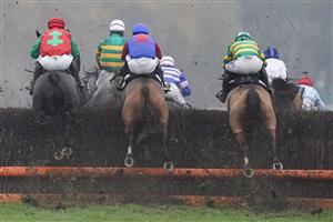 ASCOT, ENGLAND - NOVEMBER 20: Jonjo O'Neill riding Quarenta (L) on their way to winning The Watch Racing Free Online At Coral Handicap Chase at Ascot Racecourse on November 20, 2020 in Ascot, England. Owners are allowed to attend if they have a runner at the meeting otherwise racing remains behind closed doors to the public due to the Coronavirus pandemic. (Photo by Alan Crowhurst/Getty Images)