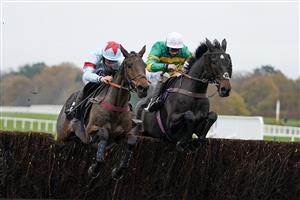 ASCOT, ENGLAND - NOVEMBER 20: Charlie Deutsch riding Espoir de Guye (L) clear the last to win The Coral Handicap Chase at Ascot Racecourse on November 20, 2020 in Ascot, England. Owners are allowed to attend if they have a runner at the meeting otherwise racing remains behind closed doors to the public due to the Coronavirus pandemic. (Photo by Alan Crowhurst/Getty Images)
