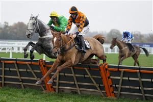 ASCOT, ENGLAND - NOVEMBER 20: Nico de Boinville riding Buzz (green) clear the last to win The Coral 'Fail To Finish' Free Bet Handicap Hurdle at Ascot Racecourse on November 20, 2020 in Ascot, England. Owners are allowed to attend if they have a runner at the meeting otherwise racing remains behind closed doors to the public due to the Coronavirus pandemic. (Photo by Alan Crowhurst/Getty Images)