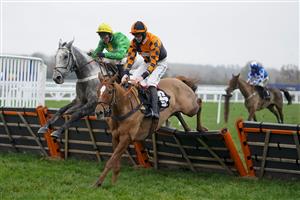 ASCOT, ENGLAND - NOVEMBER 20: Nico de Boinville riding Buzz (green) clear the last to win The Coral 'Fail To Finish' Free Bet Handicap Hurdle at Ascot Racecourse on November 20, 2020 in Ascot, England. Owners are allowed to attend if they have a runner at the meeting otherwise racing remains behind closed doors to the public due to the Coronavirus pandemic. (Photo by Alan Crowhurst/Getty Images)