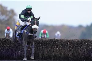 ASCOT, ENGLAND - NOVEMBER 21: David Bass riding First Flow clear the last to win The Coral Hurst Park Handicap Chase at Ascot Racecourse on November 21, 2020 in Ascot, England. Owners are allowed to attend if they have a runner at the meeting otherwise racing remains behind closed doors to the public due to the Coronavirus pandemic. (Photo by Alan Crowhurst/Getty Images)