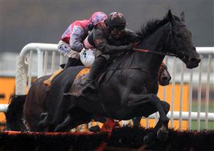 MANCHESTER, ENGLAND - NOVEMBER 21: A muddy Jonjo O'Neill Jr aboard Third Wind during the Betfair Exchange Stayers' Handicap Hurdle at Haydock Park, Merseyside on November 21, 2020 in Manchester, England. (Photo by Mike Egerton - Pool/Getty Images)