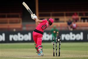 SYDNEY, AUSTRALIA - NOVEMBER 22: Erin Burns of the Sixers is bowled by Tess Flintoff of the Stars during the Women's Big Bash League WBBL match between the Melbourne Stars and the Sydney Sixers at North Sydney Oval, on November 22, 2020, in Sydney, Australia. (Photo by Cameron Spencer/Getty Images)