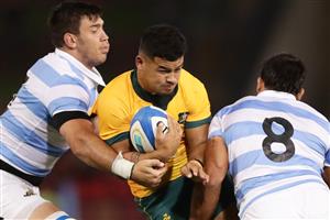 NEWCASTLE, AUSTRALIA - NOVEMBER 21: Hunter Paisami of the Wallabies is tackled during the 2020 Tri-Nations match between the Australian Wallabies and the Argentina Pumas at McDonald Jones Stadium on November 21, 2020 in Newcastle, Australia. (Photo by Mark Metcalfe/Getty Images)