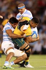 NEWCASTLE, AUSTRALIA - NOVEMBER 21: Hunter Paisami of the Wallabies is tackled during the 2020 Tri-Nations match between the Australian Wallabies and the Argentina Pumas at McDonald Jones Stadium on November 21, 2020 in Newcastle, Australia. (Photo by Mark Kolbe/Getty Images)