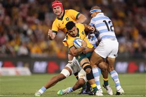 NEWCASTLE, AUSTRALIA - NOVEMBER 21: Hunter Paisami of the Wallabies is tackled by Santiago Chocobares of the Pumas during the 2020 Tri-Nations match between the Australian Wallabies and the Argentina Pumas at McDonald Jones Stadium on November 21, 2020 in Newcastle, Australia. (Photo by Mark Metcalfe/Getty Images)