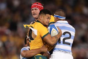 NEWCASTLE, AUSTRALIA - NOVEMBER 21: Hunter Paisami of the Wallabies is tackled by Santiago Chocobares of the Pumas during the 2020 Tri-Nations match between the Australian Wallabies and the Argentina Pumas at McDonald Jones Stadium on November 21, 2020 in Newcastle, Australia. (Photo by Mark Metcalfe/Getty Images)