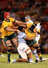 NEWCASTLE, AUSTRALIA - NOVEMBER 21: Hunter Paisami of the Wallabies is tackled during the 2020 Tri-Nations match between the Australian Wallabies and the Argentina Pumas at McDonald Jones Stadium on November 21, 2020 in Newcastle, Australia. (Photo by Mark Kolbe/Getty Images)