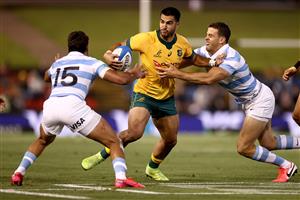 NEWCASTLE, AUSTRALIA - NOVEMBER 21: Tom Wright of Australia is tackled during the 2020 Tri-Nations match between the Australian Wallabies and the Argentina Pumas at McDonald Jones Stadium on November 21, 2020 in Newcastle, Australia. (Photo by Cameron Spencer/Getty Images)