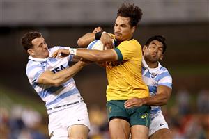 NEWCASTLE, AUSTRALIA - NOVEMBER 21: Jordan Petaia of Australia is tackled during the 2020 Tri-Nations match between the Australian Wallabies and the Argentina Pumas at McDonald Jones Stadium on November 21, 2020 in Newcastle, Australia. (Photo by Cameron Spencer/Getty Images)