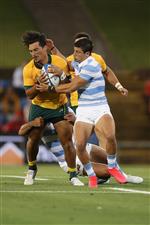 NEWCASTLE, AUSTRALIA - NOVEMBER 21: Jordan Petaia of the Wallabies is tackled during the 2020 Tri-Nations match between the Australian Wallabies and the Argentina Pumas at McDonald Jones Stadium on November 21, 2020 in Newcastle, Australia. (Photo by Mark Metcalfe/Getty Images)