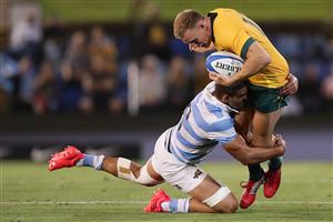 NEWCASTLE, AUSTRALIA - NOVEMBER 21: Reece Hodge of the Wallabies is tackled by Pablo Matera of the Pumas during the 2020 Tri-Nations match between the Australian Wallabies and the Argentina Pumas at McDonald Jones Stadium on November 21, 2020 in Newcastle, Australia. (Photo by Mark Metcalfe/Getty Images)