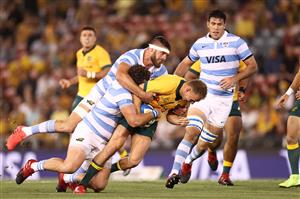 NEWCASTLE, AUSTRALIA - NOVEMBER 21: Reece Hodge of Australia is tackled during the 2020 Tri-Nations match between the Australian Wallabies and the Argentina Pumas at McDonald Jones Stadium on November 21, 2020 in Newcastle, Australia. (Photo by Cameron Spencer/Getty Images)