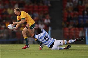NEWCASTLE, AUSTRALIA - NOVEMBER 21: Reece Hodge of the Wallabies is tackled by Matias Alemanno of the Pumas during the 2020 Tri-Nations match between the Australian Wallabies and the Argentina Pumas at McDonald Jones Stadium on November 21, 2020 in Newcastle, Australia. (Photo by Mark Metcalfe/Getty Images)