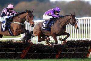 WETHERBY, UNITED KINGDOM - NOVEMBER 25: Abington Park ridden by jockey Thomas Dowson clear a fence during the Follow @racingtv On Twitter Novices' Hurdle (GBB Race) at Wetherby Racecourse on November 25, 2020 in Wetherby, England. (Photo by Mike Egerton - Pool/Getty Images)