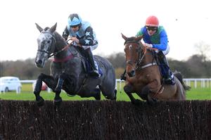 WETHERBY, UNITED KINGDOM - NOVEMBER 25: Born By The Sea ridden by jockey Jack G Gilligan (right) clear a fence alongside Geordie B and Aidan Coleman on the way to winning the Sixt Car Hire Intermediate Chase at Wetherby Racecourse on November 25, 2020 in Wetherby, England. (Photo by Mike Egerton - Pool/Getty Images)