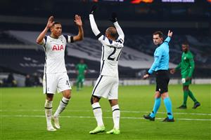 LONDON, ENGLAND - NOVEMBER 26: Lucas Moura of Tottenham Hotspur (right) celebrates with Carlos Vinicius of Tottenham Hotspur after scoring his teams fourth goal during the UEFA Europa League Group J stage match between Tottenham Hotspur and PFC Ludogorets Razgrad at Tottenham Hotspur Stadium on November 26, 2020 in London, England. Sporting stadiums around the UK remain under strict restrictions due to the Coronavirus Pandemic as Government social distancing laws prohibit fans inside venues resulting in games being played behind closed doors. (Photo by Clive Rose/Getty Images)