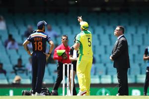 SYDNEY, AUSTRALIA - NOVEMBER 27: Virat Kohli of India calls as Aaron Finch of Australia tosses the coin before game one of the One Day International series between Australia and India at Sydney Cricket Ground on November 27, 2020 in Sydney, Australia. (Photo by Mark Kolbe/Getty Images)