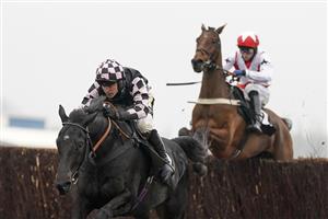 NEWBURY, ENGLAND - NOVEMBER 28: Jack Tudor riding Cap Du Nord clear the last to win The Sir Peter O'Sullevan Memorial Handicap Chase at Newbury Racecourse on November 28, 2020 in Newbury, England. Owners are allowed to attend if they have a runner at the meeting otherwise racing remains behind closed doors to the public due to the Coronavirus pandemic. (Photo by Alan Crowhurst/Getty Images)