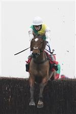 NEWBURY, ENGLAND - NOVEMBER 28: Tom Scudamore riding Cloth Cap clear the last to win The Ladbrokes Trophy Chase at Newbury Racecourse on November 28, 2020 in Newbury, England. Owners are allowed to attend if they have a runner at the meeting otherwise racing remains behind closed doors to the public due to the Coronavirus pandemic. (Photo by Alan Crowhurst/Getty Images)