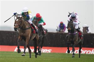NEWBURY, ENGLAND - NOVEMBER 28: Tom Scudamore riding Cloth Cap (white cap) clear the last to win The Ladbrokes Trophy Chase at Newbury Racecourse on November 28, 2020 in Newbury, England. Owners are allowed to attend if they have a runner at the meeting otherwise racing remains behind closed doors to the public due to the Coronavirus pandemic. (Photo by Alan Crowhurst/Getty Images)