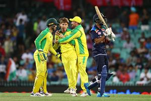 SYDNEY, AUSTRALIA - NOVEMBER 29: Aaron Finch of Australia congratulates Adam Zampa of Australia after dismissing KL Rahul of India during game two of the One Day International series between Australia and India at Sydney Cricket Ground on November 29, 2020 in Sydney, Australia. (Photo by Cameron Spencer/Getty Images)
