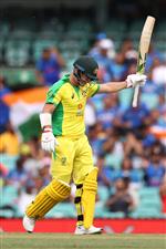 SYDNEY, AUSTRALIA - NOVEMBER 29: David Warner of Australia celebrates reaching 50 runs during game two of the One Day International series between Australia and India at Sydney Cricket Ground on November 29, 2020 in Sydney, Australia. (Photo by Cameron Spencer/Getty Images)