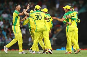 SYDNEY, AUSTRALIA - NOVEMBER 29: Josh Hazlewood of Australia celebrates with Moises Henriques of Australia after dismissing Virat Kohli of India during game two of the One Day International series between Australia and India at Sydney Cricket Ground on November 29, 2020 in Sydney, Australia. (Photo by Cameron Spencer/Getty Images)