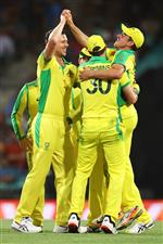SYDNEY, AUSTRALIA - NOVEMBER 29: Josh Hazlewood of Australia celebrates with Moises Henriques of Australia after dismissing Virat Kohli of India during game two of the One Day International series between Australia and India at Sydney Cricket Ground on November 29, 2020 in Sydney, Australia. (Photo by Cameron Spencer/Getty Images)