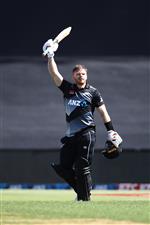 TAURANGA, NEW ZEALAND - NOVEMBER 29: Glenn Phillips of New Zealand celebrates his century during game two of the International Twenty20 series between New Zealand and the West Indies at Bay Oval on November 29, 2020 in Tauranga, New Zealand. (Photo by Phil Walter/Getty Images)