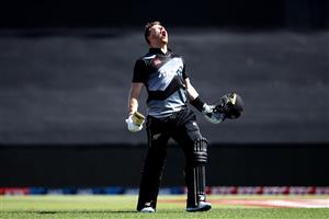 TAURANGA, NEW ZEALAND - NOVEMBER 29: Glenn Phillips of New Zealand celebrates his century during game two of the International Twenty20 series between New Zealand and the West Indies at Bay Oval on November 29, 2020 in Tauranga, New Zealand. (Photo by Phil Walter/Getty Images)
