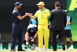 SYDNEY, AUSTRALIA - NOVEMBER 29: Aaron Finch of Australia and Virat Kohli of India fist pump before the start of game two of the One Day International series between Australia and India at Sydney Cricket Ground on November 29, 2020 in Sydney, Australia. (Photo by Ryan Pierse/Getty Images)