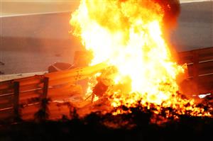 BAHRAIN, BAHRAIN - NOVEMBER 29: A fire is pictured following the crash of Romain Grosjean of France and Haas F1 during the F1 Grand Prix of Bahrain at Bahrain International Circuit on November 29, 2020 in Bahrain, Bahrain. (Photo by Bryn Lennon/Getty Images)