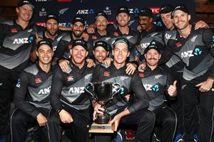 TAURANGA, NEW ZEALAND - NOVEMBER 30: New Zealand pose with the T20 series trophy following game three of the International Twenty20 series between New Zealand and the West Indies at Bay Oval on November 30, 2020 in Tauranga, New Zealand. (Photo by Phil Walter/Getty Images)