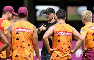 BRISBANE, AUSTRALIA - DECEMBER 01: Brisbane Lions AFL player Daniel Rich is seen giving tips to the players during a Brisbane Broncos NRL training session at the Clive Berghofer Centre on December 01, 2020 in Brisbane, Australia. (Photo by Bradley Kanaris/Getty Images)