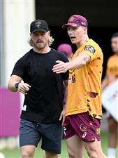 BRISBANE, AUSTRALIA - DECEMBER 01: Brisbane Lions AFL player Daniel Rich is seen giving tips to Tyson Gamble during a Brisbane Broncos NRL training session at the Clive Berghofer Centre on December 01, 2020 in Brisbane, Australia. (Photo by Bradley Kanaris/Getty Images)